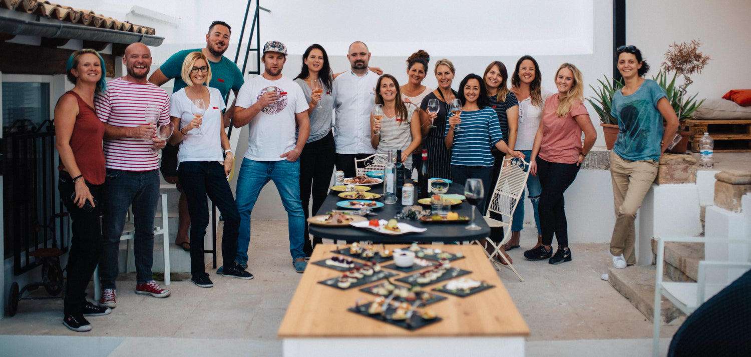 All yacht chefs at the table after a successful superyacht chef cooking class.